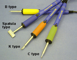 Example of different colored sleeve assemblies used to distinguish soldering irons